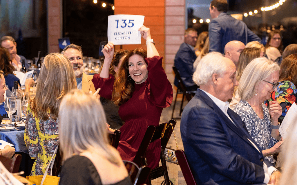 Guests bidding at the Greater Heights Night gala