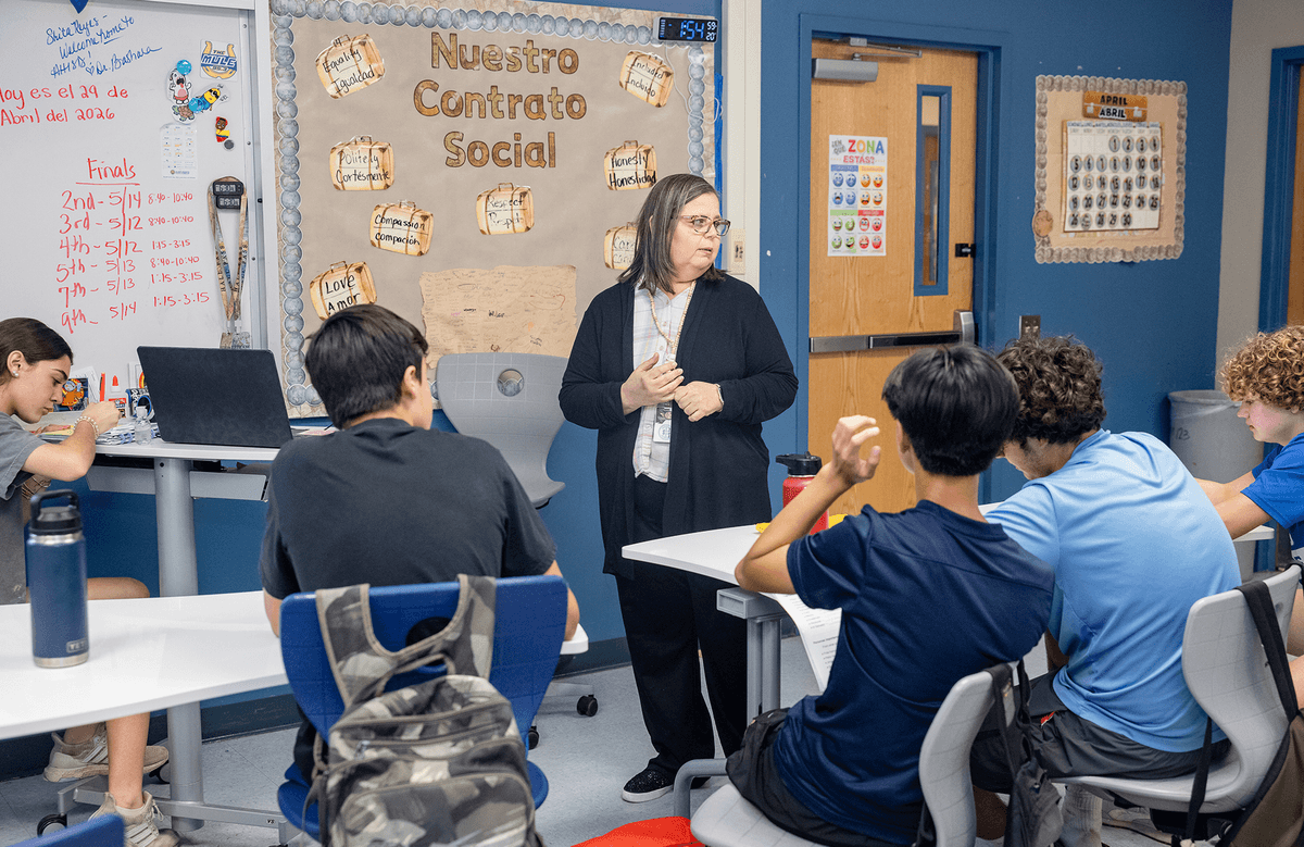 Teacher engaging with students in a classroom