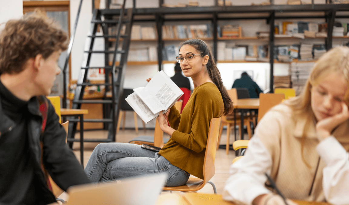 Students studying together in the school library